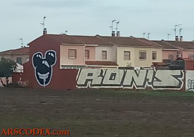 Grafitti with a modified silhouette of Mickey Mouse on the outskirts of Madrid